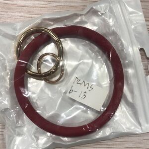 Chic Red Bangle with Gold Rings